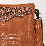 close up of fringe - floral tooling and white boot stitching