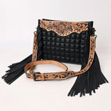 Black Leather Puff purse with Floral tooling and matching buckle strap. Black fringe