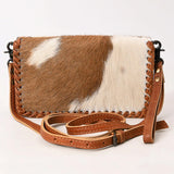 Brown hide purse with leather strap