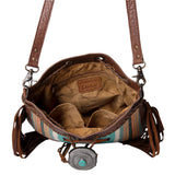 Top view - leather closure with concho. Inside zipper pocket and two side pockets