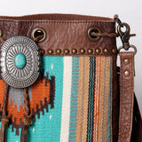 close up of leather detail and concho