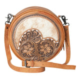 canteen purse with hide and floral tooling and a shoulder strap 