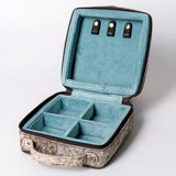 Inside of the case, it has soft turquoise colored fabric, four compartments, and top has three leather snap loops. 