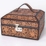 Square tooled leather jewelry case with handle on the top and silver lock on the front. 