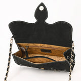 Open flap view. Flap has snap closer. Zipper pocket inside and a open inside pocket. 