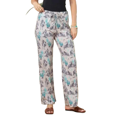 Person wearing grey and teal western print lounge pants