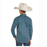 Back view of boy wearing an aqua paisley print long sleeve shirt