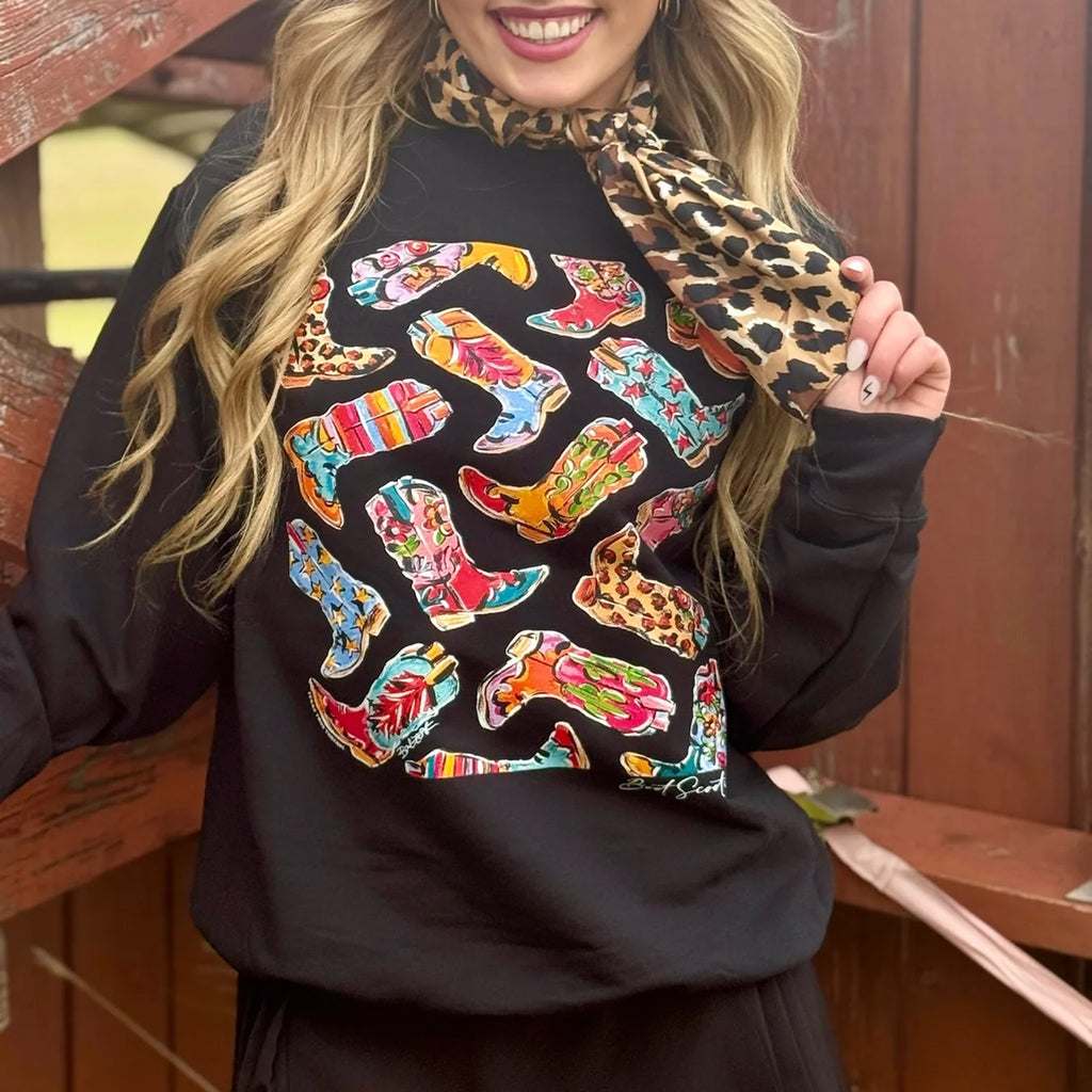 black sweatshirt with multicolored cowboy boots graphic on front