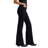 Side view of a model wearing the Wrangler Black Savanah Bespoke Trouser Jeans, highlighting the sleek trouser leg, tailored fit, and smooth black denim.