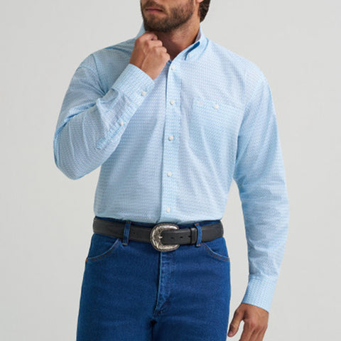 Light blue long sleeve button down shirt with white geometric print. 
