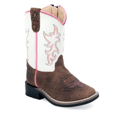 Single square toe boot side facing. The boot has a white shafter with pink fancy stitching. The base is brown with pink boot stitching. 