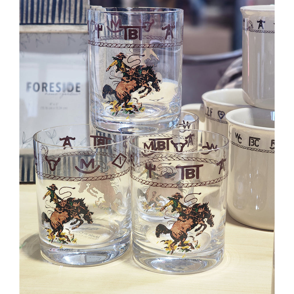 Whiskey glasses with bronc and brands at the top 