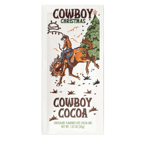 Cowboy Christmas Cocoa package with a cowboy on a horse and Christmas tree illustration.