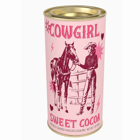 Can of 'Cowgirl Sweet Cocoa' with a pink label featuring a cowgirl and horse illustration,