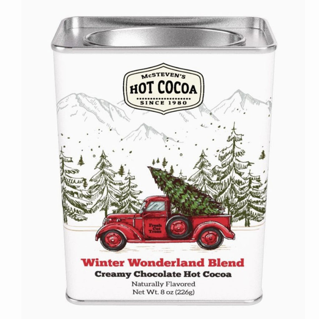 Hot Cocoa tin with a Christmas tree and red truck design on the tin container.