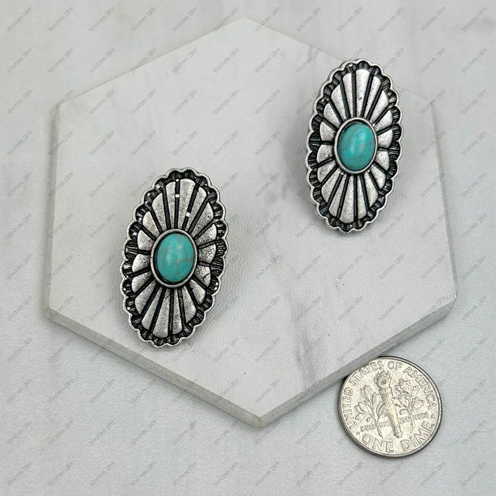 Close up view of Silver & Turquoise Oval Concho Earrings 
