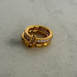 Gold Grace rings, one with stones and one solid gold 