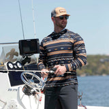 Navy and tan sun shirt with hood outside.