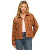 Woman wearing a brown corduroy jacket with ruffle detailing on the front