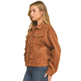 Side view of woman wearing a brown corduroy jacket with ruffle detailing on the front