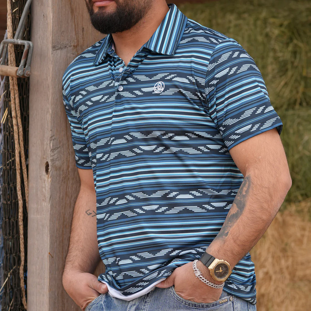 Full front and side view of male model wearing the deep blue polo. 