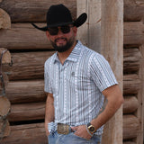 Full front and side view of male model wearing white and blue striped polo.