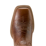 Close-up of a brown leather boot with intricate stitching