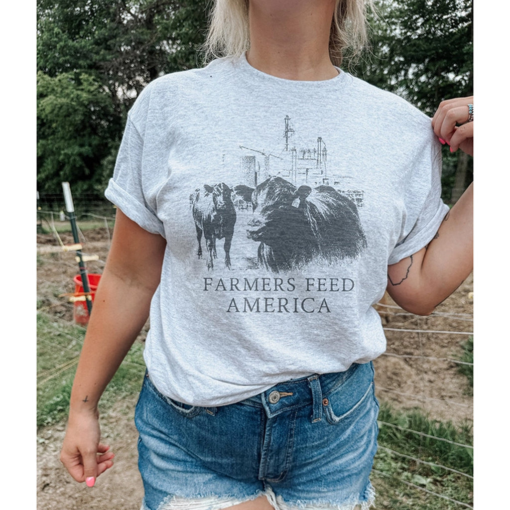 Women's grey t shirt with cow graphic on front