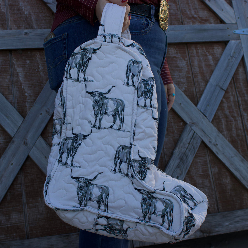White quilted boot bag with black and gray long horn graphics.