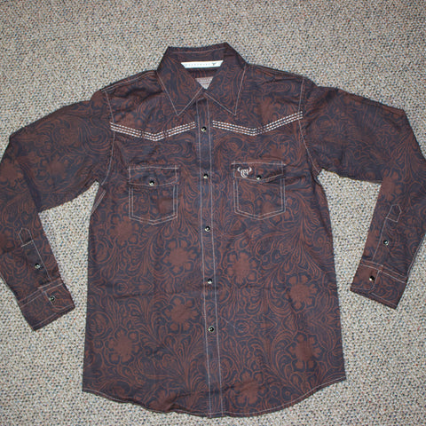 Flat lay of brown tooled floral long sleeve shirt with black pearl snaps. 