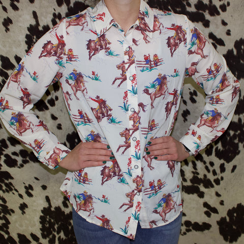 Cream colored long sleeve button down with vintage desert western prints and pearl snaps. 