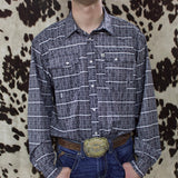 Black collared long sleeve pearl snap shirt with white Aztec print.