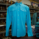 Light blue long sleeve pearl snap shirt.