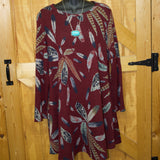 Burgundy colored long sleeve, above the knee length dress with feathers printed all over. 