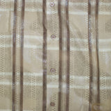 Close up view of the fabric, shirt has shiny hue. 