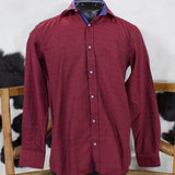 Burgundy long sleeve button down shirt with a diamond print and blue contrast collar and cuffs. 