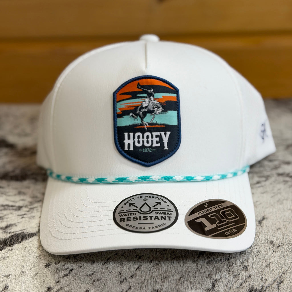 Front side view of the white Hooey hat with orange, teal, and black patch. 