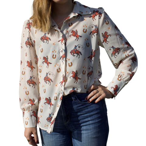 Front side view of model wearing the cream horse chiffon long sleeve shirt