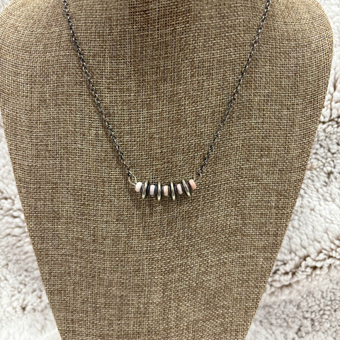 Necklace with alternating pink stones and Navajo pearl saucers 