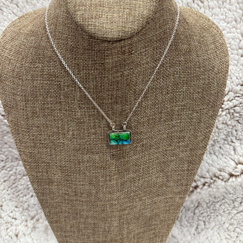 Sterling Silver chain with a small rectangular green and turquoise stone with gold accents necklace 