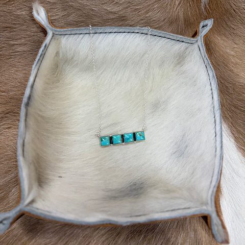necklace with sterling silver chain with a bar of 4 Kingman Turquoise Stones 