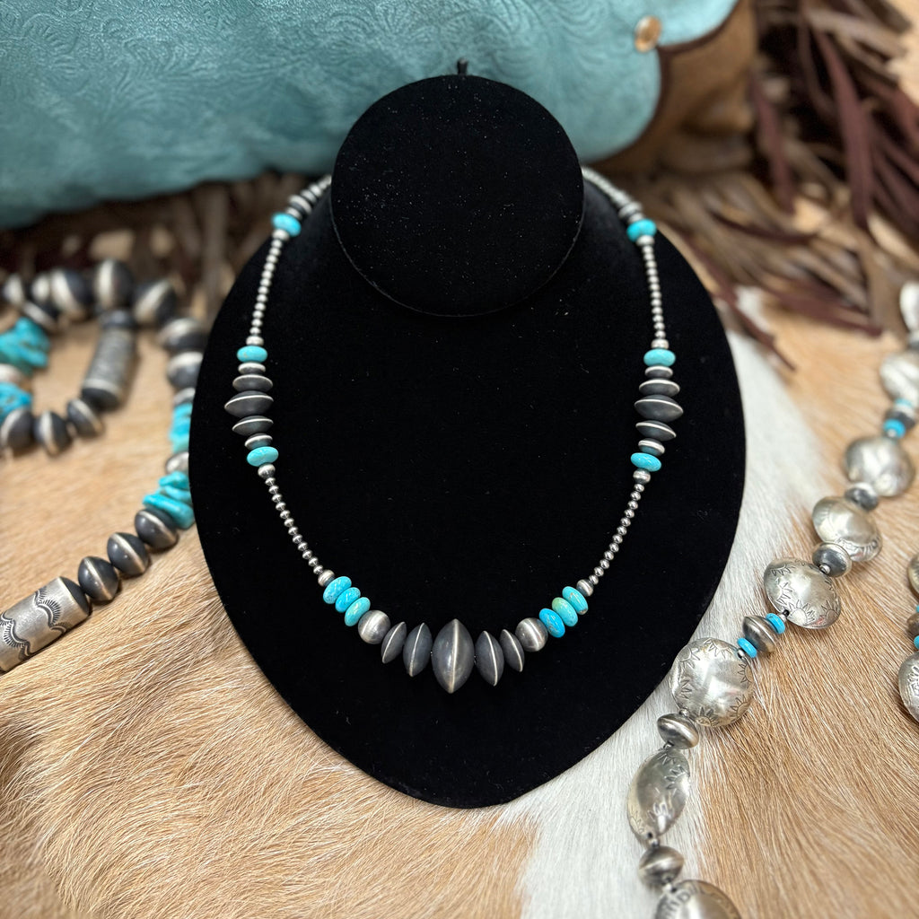 18 inch Navajo pearl necklace with graduated pearls, graduated saucer pearls, and Kingman Turquoise stones.