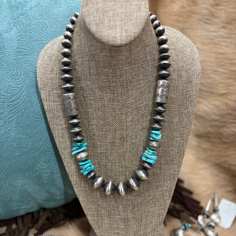 22" Navajo pearl necklace with graduated saucer pearls, flat turquoise stones, and stamped Navajo pearls 