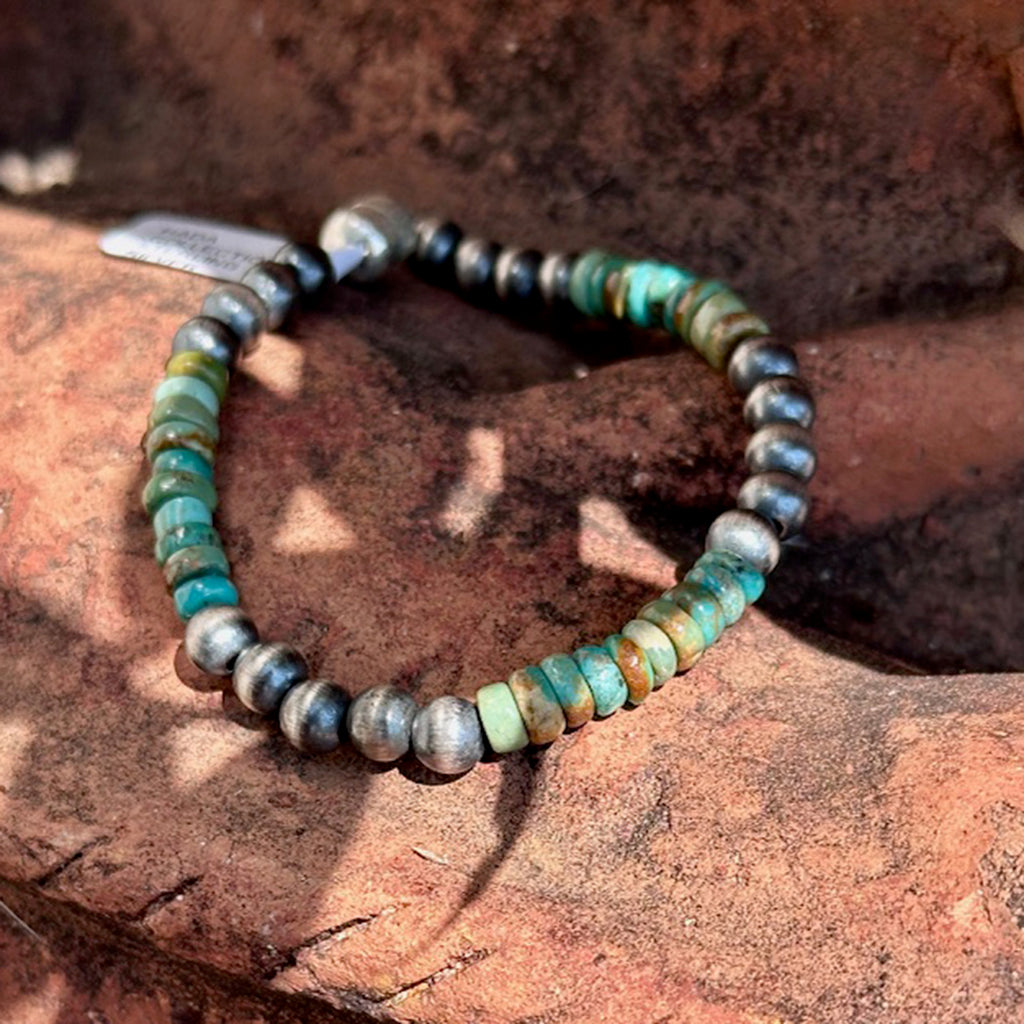 green red river stones mixed with sterling silver pearls. 