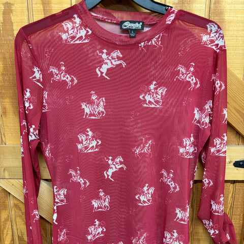 hanging picture of long sleeve red mesh top that has white desert bronc designs 