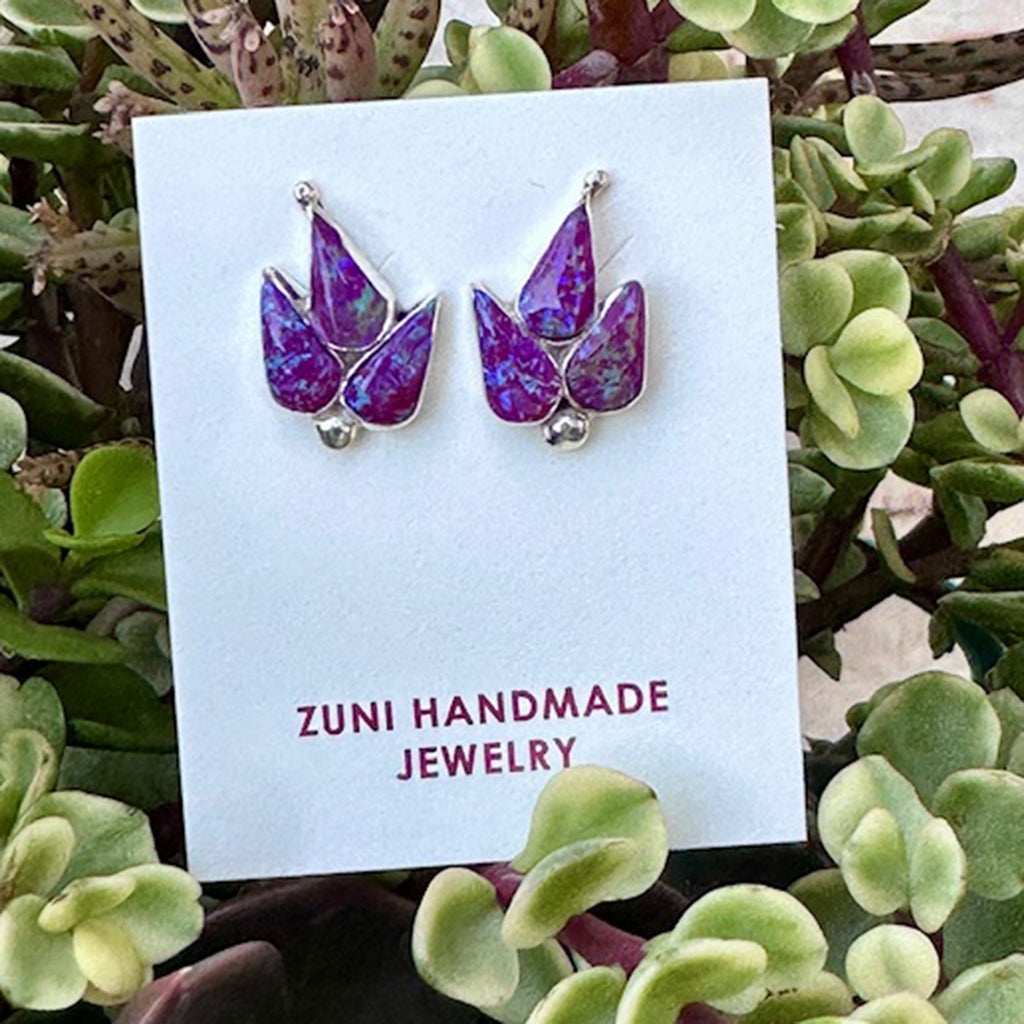Zuni handmade purple opal  earrings on a card with succulents in the background