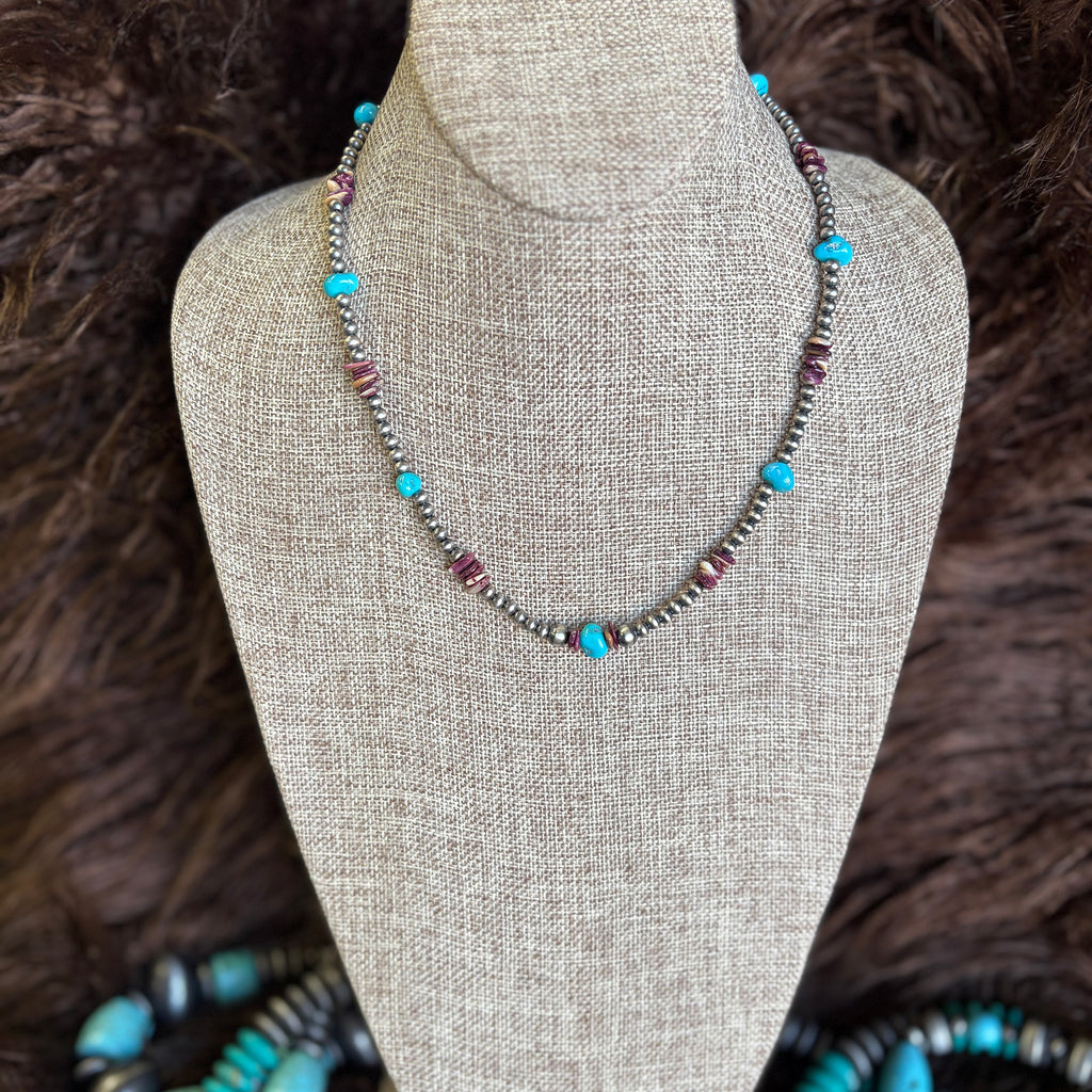 Beaded necklace with Navajo pearls and alternating purple stones and turquoise stones 