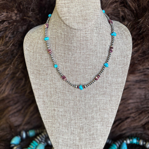 Beaded necklace with Navajo pearls and alternating purple stones and turquoise stones 