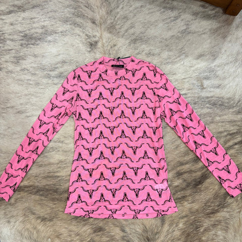 Hot pink mesh top with black cow skulls alternating right side up and upside down 