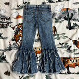 Flat lay view of the back of the jeans, no detailing on the pockets.